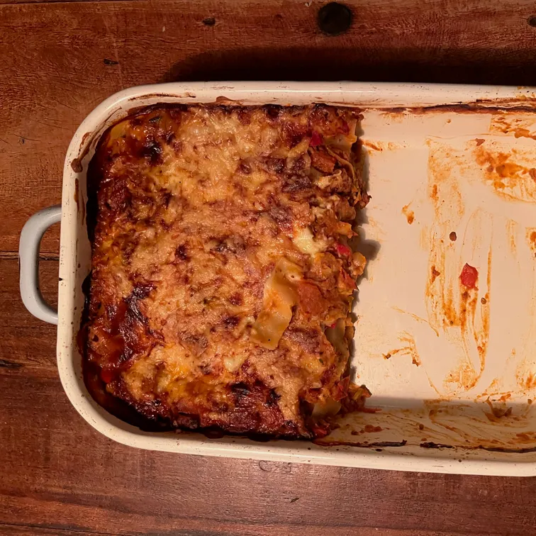 A rich and comforting layered pasta dish with meat sauce and bechamel.